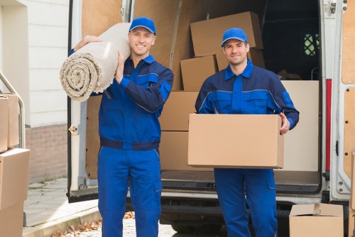 Packed boxes and furniture for a residential or office move in Aldgate