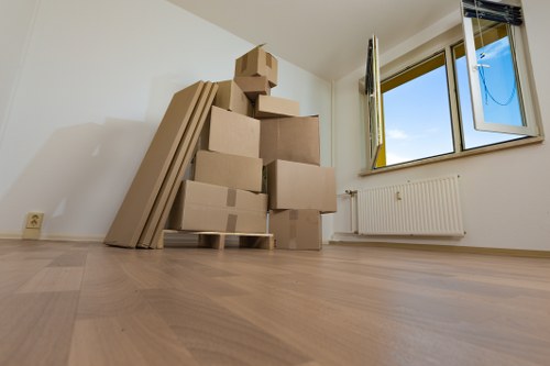 Collection of sofas and bulky household furniture from an Aldgate property