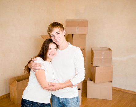 Careful loading of household items for a move in Aldgate