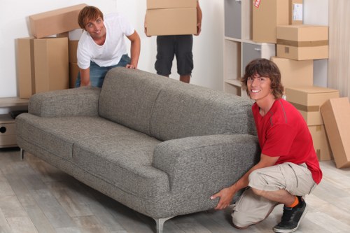 Team using moving equipment with care during transport