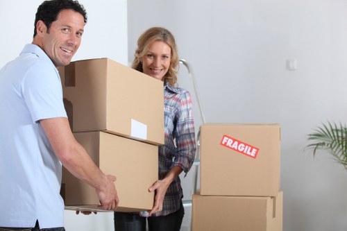 Packed household boxes ready for removals in Aldgate