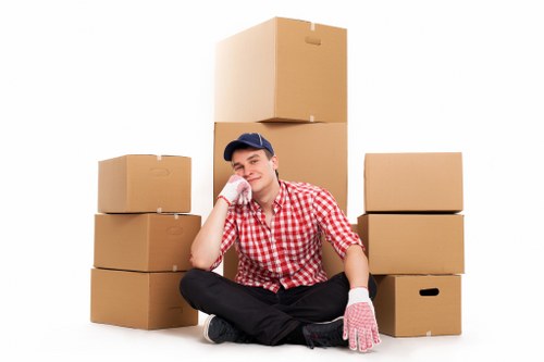 Moving furniture through a flat building in Aldgate with access challenges